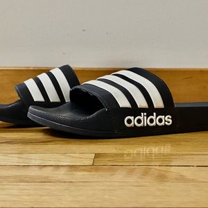 Dark blue adidas slides